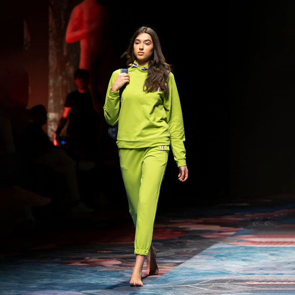 Acid green jumpsuit with patterned hood